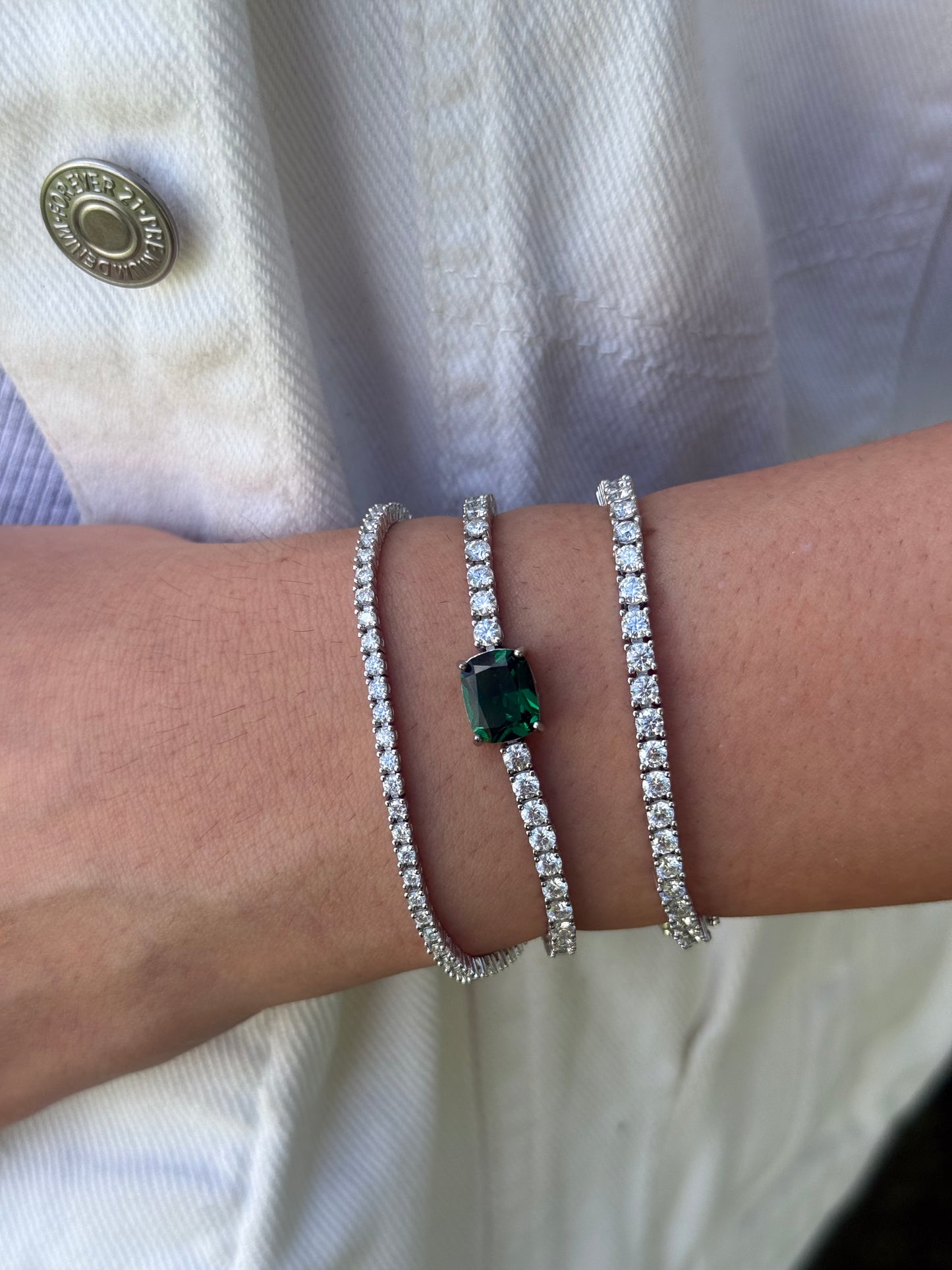 Tennis Bracelet with Emerald/Ruby Center