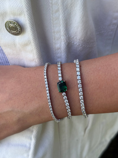 Tennis Bracelet with Emerald/Ruby Center