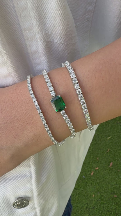 Tennis Bracelet with Emerald/Ruby Center